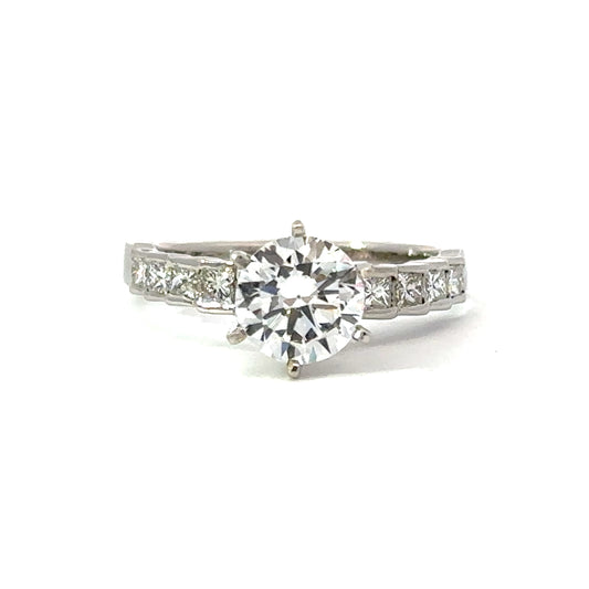 Side Stone Step Channel Engagement Ring in Platinum