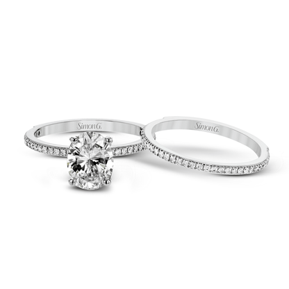 Oval-cut Engagement Ring & Matching Wedding Band in 18k Gold with Diamonds