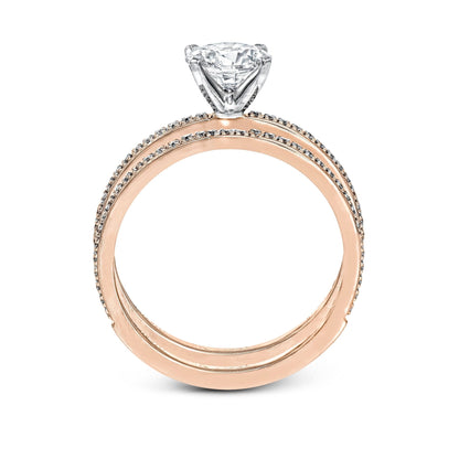 Oval-cut Engagement Ring & Matching Wedding Band in 18k Gold with Diamonds